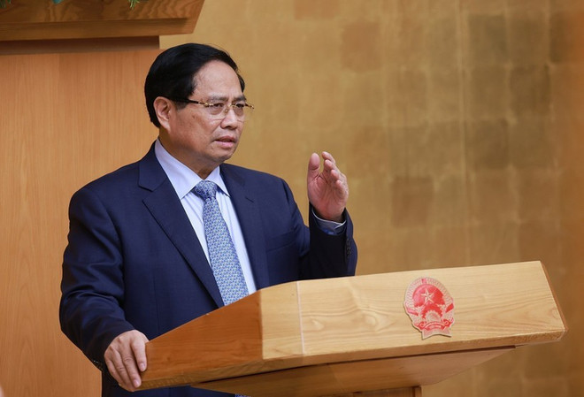 范明政总理发言。图自越通社 vna-potal-thu-tuong-chu-tri-hop-danh-gia-ket-qua-van-hanh-mo-hinh-chinh-quyen-dia-phuong-hai-cap-8309940.jpg