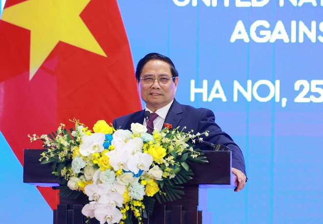 越南政府总理范明政发言。图自越通社 1761382398796.jpg