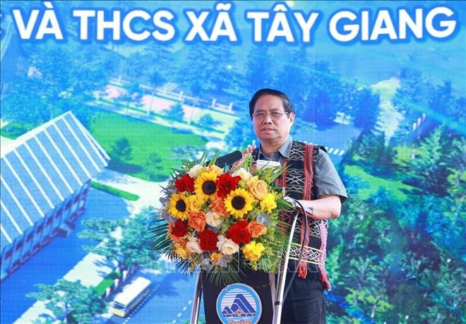 范明政在仪式上发表讲话。图自越通社 thu-tuong-phat-bieu.jpg