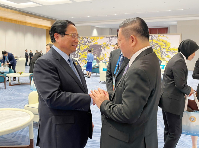 范明政与会见东盟秘书长高金洪回见。图自越通社 vna-potal-thu-tuong-gap-lanh-dao-mot-so-nuoc-va-to-chuc-tham-du-sco-2025-8247280.jpg