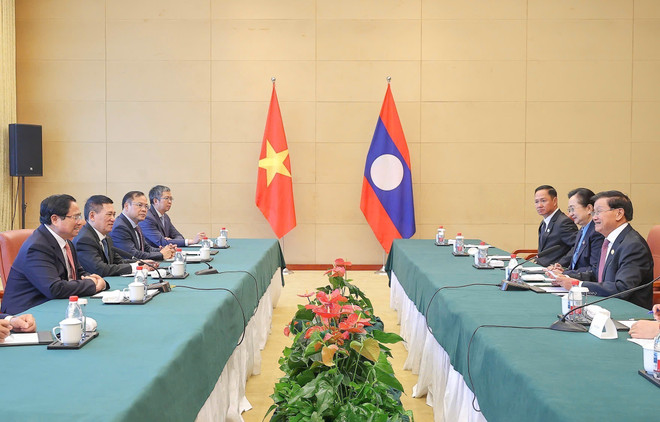 会见现场。图自越通社 vna-potal-thu-tuong-gap-tong-bi-thu-chu-tich-nuoc-lao-thongloun-sisoulith-8248845.jpg