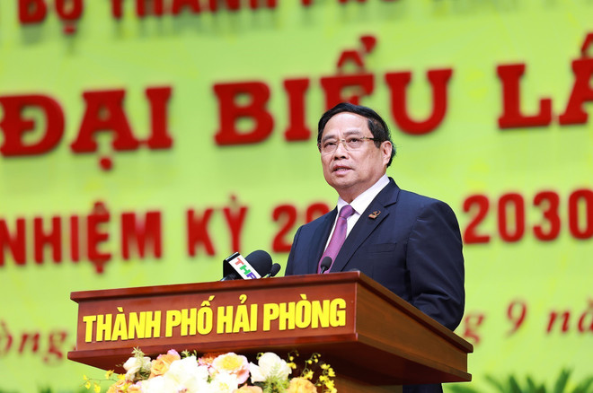 越南政府总理范明政在会上发言。图自越通社 vna-potal-tien-toi-dai-hoi-xiv-cua-dang-thu-tuong-du-dai-hoi-dai-bieu-dang-bo-thanh-pho-hai-phong-lan-thu-nhat-8299944.jpg