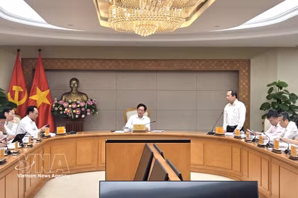 越南政府副总理胡国勇主持会议。图自越通社