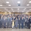 出席论坛的代表们合影。图自越通社