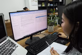 在查询和处理法律信息中应用人工智能。图自越通社