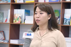 旅老越侨阮氏秋玄对越南正在实施多项创新政策感到高兴和自豪。图自越通社