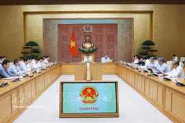 越南政府总理黎明兴主持召开会议，研究《投资法》修订案、《招标法》修订案、《国家预算统一法》草案和《中小企业发展法》草案以及相关法律草案中的土地财政、土地价格等问题 图自越通社