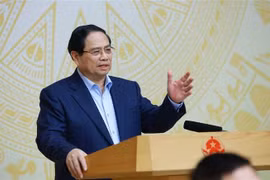 越南政府总理、指导委员会主任范明政在会议上发表讲话。图自越通社