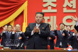 2月22日，朝鲜最高领导人金正恩在平壤出席朝鲜劳动党第九次代表大会。图片来源：韩联社/越通社