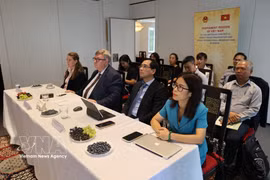 出席研讨会的各位代表。图自越通社