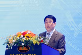 越南国家主席梁强出席研讨会并发表指导性讲话。图自越通社