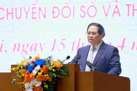 越南政府总理范明政在会议上发表讲话。图自越通社