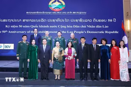 与会代表合影。图自越通社