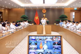 会议现场。图自越通社