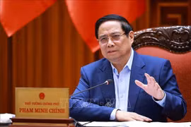 范明政总理在会上发言。图自越通社