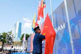 越南国旗升旗仪式。图自越通社