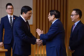 越南政府总理范明政会见了中共中央委员、广西壮族自治区党委副书记、自治区人民政府主席韦韬。图自越通社
