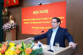 范明政在会上发表讲话。图自越通社