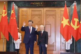 中共中央总书记、国家主席习近平于2023年12月12日至13日对越南进行国事访问，2023年12月12日，越共中央总书记阮富仲与中共中央总书记、国家主席习近平举行会谈。图自越通社