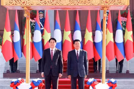 通伦·西苏里举行仪式 欢迎越南国家主席梁强访老
