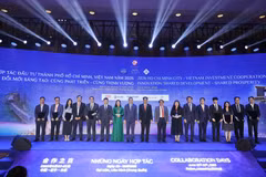 与会代表合影。图自越通社