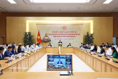 会议现场。图自越通社