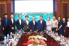 双方代表合影。图自越通社