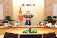 会议场景。图自越通社