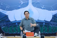 范明政总理发言。图自越通社