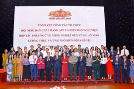 与会代表合影。图自越通社