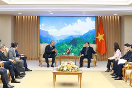 会见场景。图自越通社