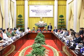 新闻发布会现场。图自越通社