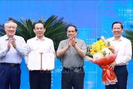 政府总理范明政出席胡志明市规划公布仪式。图自越通社