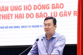 越南祖国阵线胡志明市委员会副主席潘红恩发言。图自越通社