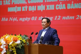 范明政总理在会议上发言。图自越通社