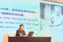 “胡志明在中国”专题座谈会现场。图自越通社