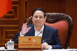 范明政总理发言。图自越通社
