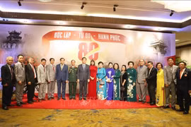 与会代表合影。图自越通社
