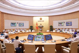 政府总理范明政主持召开政府9月份例行会议。图自越通社