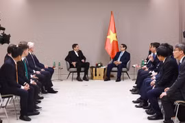 范明政会见斯柯达首席执行官克劳斯。图自越通社