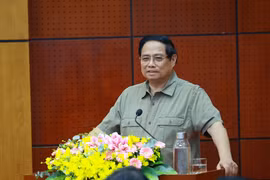 范明政总理在会议上发言。图自越通社