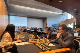 会议场景。图自越通社