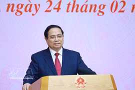 越南政府总理范明政发表讲话。图自越通社