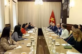 会见场景。图自越通社