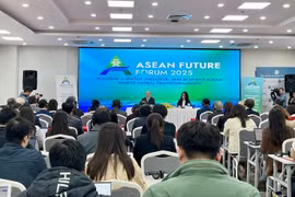 记者会场景。图自越通社
