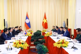 会见场景。图自越通社