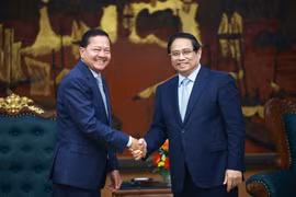 政府总理范明政会见柬埔寨副首相内沙文。图自越通社