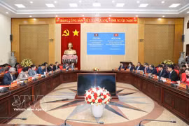 工作会谈现场。图自越通社