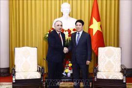 越南国家主席梁强会见阿塞拜疆总检察长卡姆兰·阿利耶夫。图自越通社