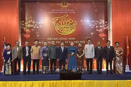 与会代表合影。图自越通社